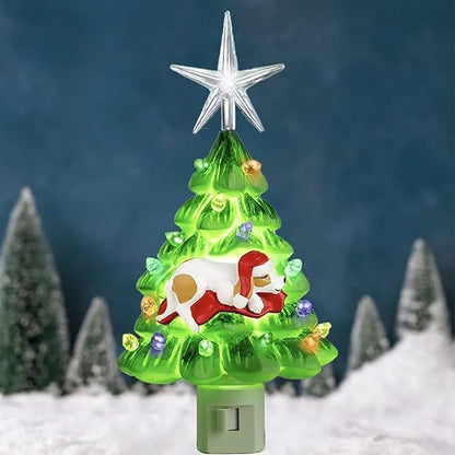 Decorative Christmas tree with Santa Claus design and star on top against a snowy landscape background.